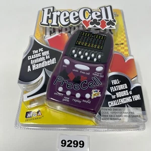 FreeCell elektronisches Handheld-Spiel von MGA 2001 - verschiedene klassische Kartenspiele - Bild 1 von 6