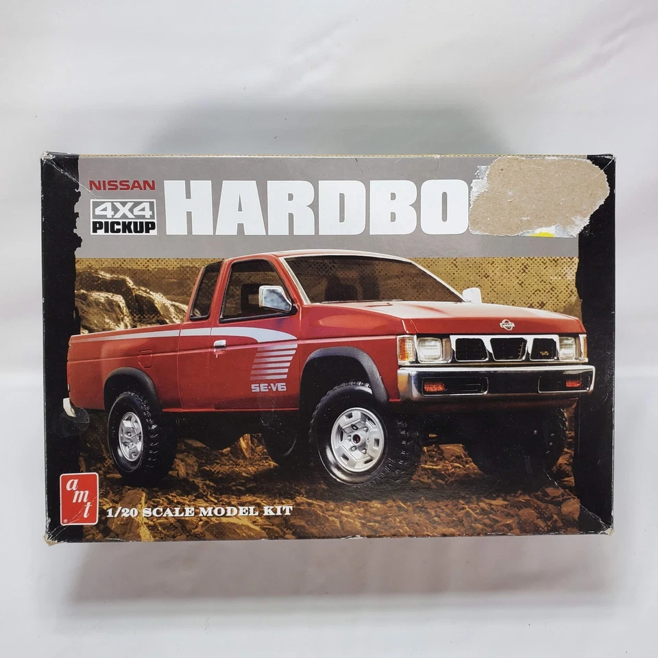 AMT Nissan Hardbody 4X4 SE-V6 1/20 Plastic Truck Model Vintage Open Box - Image 1 of 4