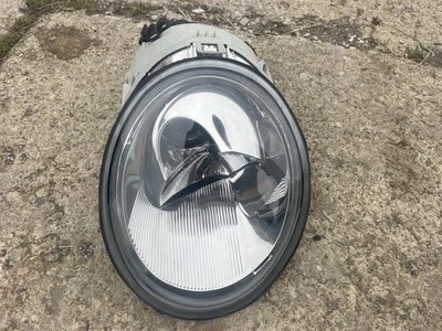 Farol de halogênio 98-05 VW Beetle lado esquerdo do motorista - Imagem 1 de 4