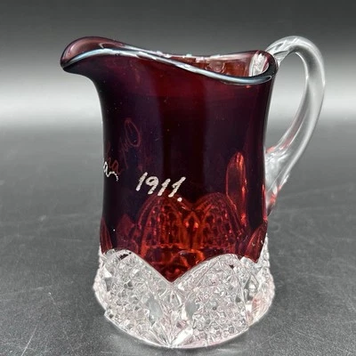 1911 Ruby Stained EAPG Souvenir Creamer “Orpha” Pattern Glass Pitcher ATQ - Image 1 of 4
