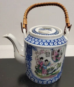Blue and White Oriental Tea Pot with lid and wicker handle - scenes on sides - Picture 1 of 12