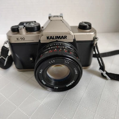 Cámara SLR de película Kalimar K-90 35 mm SIN CUBIERTA DE BATERÍA + Lente y correa de 50 mm f/1,7 Foto 1 de 4
