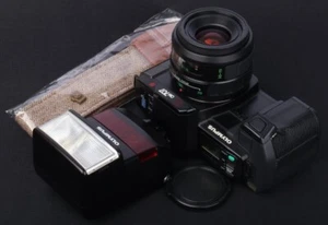 Olympus OM707 AF SLR c/w Flash Battery Grip, AF 35-70mm Lens & F280 Flash Kit - Picture 1 of 11