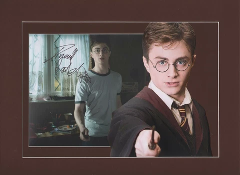 DANIEL RADCLIFFE autograph. Signed photo. Custom matted. HARRY POTTER Cover