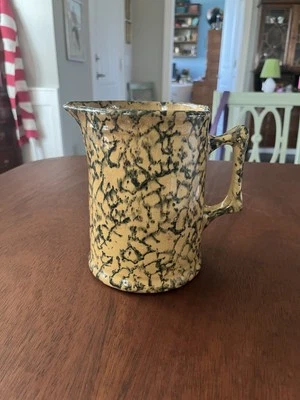 Jarra antigua azul amarilla con diseño de esponja Foto 1 de 4