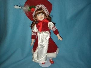 Bisque Porcelain collector doll w/red dress trimmed in faux fur and braided hair - Picture 1 of 7