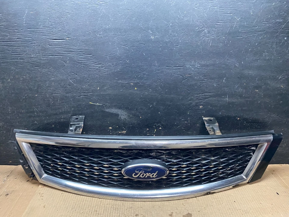 2005 2006 2007 Ford Five Hundred  Front Upper Grill Grille Logo Emblem U7759 DG - Image 1 of 4