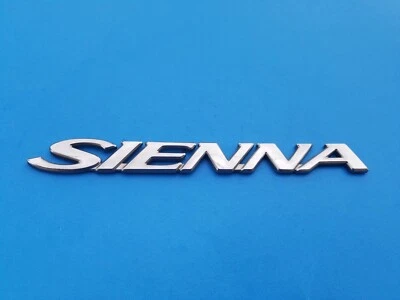 98 99 00 01 02 03 04 05 TOYOTA SIENNA TAPA PUERTA TRASERA EMBLEMA LOGOTIPO INSIGNIA OEM (2000) Foto 1 de 3