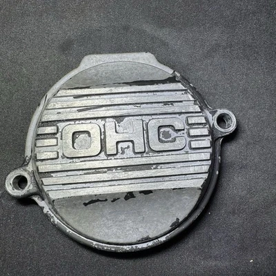 Placa de cubierta de eje de leva CRF230F CRF150F genuina OEM HONDA CRF 150 F 2003-2009 Foto 1 de 4