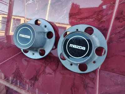 Центральные колпаки колес (2) для Mazda серии B 1994-2010 годов выпуска от оригинального производителя No F17A-1A096-aa - Изображение 1 из 4