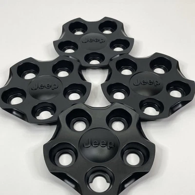 Juego de 4 tapacubos centrales negros OEM MOPAR 735577517 15 16 17 18 19 2 Jeep Renegade Foto 1 de 4