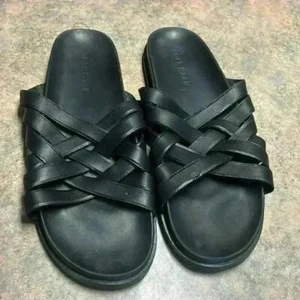 Sandalias COLE HAAN de cuero negro con correa cruzada deslizables para hombre. 12 - Imagen 1 de 7