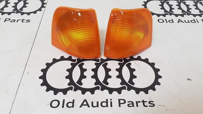 NUOVO set frecce anteriori destra + sinistra arancione Audi 100 C3 tipo 44 indicatori di direzione - Immagine 1 di 4