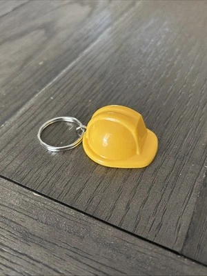 建筑帽钥匙扣 黄色塑料。 全新 — 第 1/4 张图片