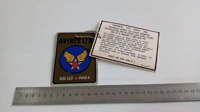 PIASTRINA LOGO AVIREX LTD. IN METALLO E CARTONCINO CON CATENELLA - Immagine 1 di 4