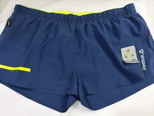 Pantaloncini sportivi Reebok uomo grandi blu/giallo riflettenti gioco corsa - Foto 1 di 5