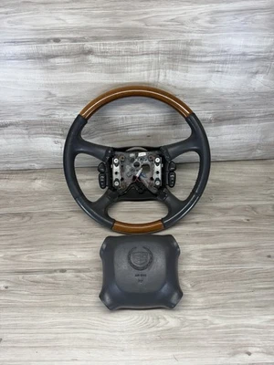 02 Volante Cadillac Escalade EXT cuero neutro grano madera volante Foto 1 de 4