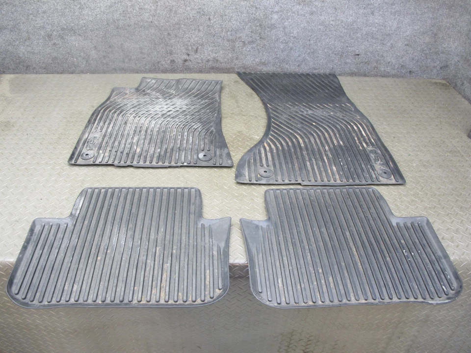 13-16 AUDI S4 B8 JUEGO DE 4 ALFOMBRILLAS DELANTERAS Y TRASERAS GOMA NEGRAS OEM Foto 1 de 4