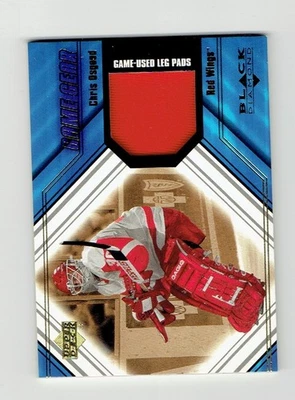 Almohadillas para piernas Chris Osgood 2000-01 Upper Deck Black Diamond Game Gear #L-OS rojas Foto 1 de 2