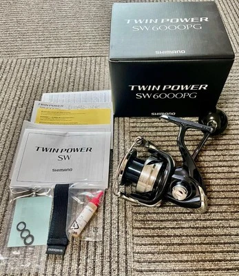Shimano 21 TWIN POWER SW 6000PG Spinnrolle mit BOX Salzwasserangeln - Bild 1 von 4
