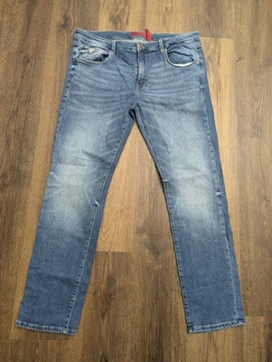 Pantalones de mezclilla elásticos de tiro medio azul ajustados Guess Jeans para hombre 36x31 Vermont Foto 1 de 4