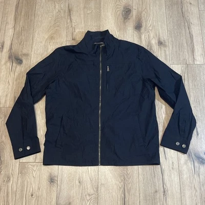 Chaqueta cortavientos Orvis para hombre grande negra elástica de nailon bolsillos con cremallera completa Foto 1 de 4