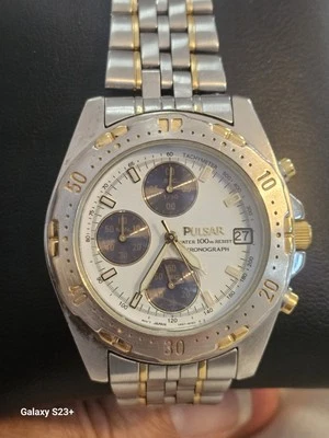 RELOJ CRONÓGRAFO VINTAGE DEPORTIVO 100m DOS TONOS TODO TITANIO ALARMA HOMBRE "PULSAR" Foto 1 de 4