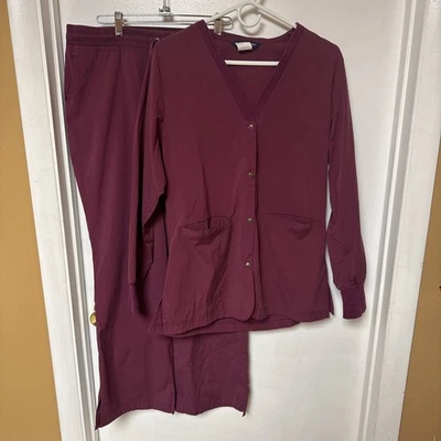 Conjunto Exfoliante Elástico Nu Dimension - Chaqueta Rubí (M) y Pantalones (L) - Usado Bueno Foto 1 de 4