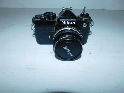 CÁMARA NIKON FE 8112215 CON LENTE SERIE E 50MM 1:1.8 (HLP5) Foto 1 de 4