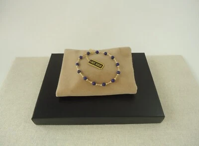 Pulsera elástica de oro amarillo de 14k y lapislázuli con cuentas México Foto 1 de 4