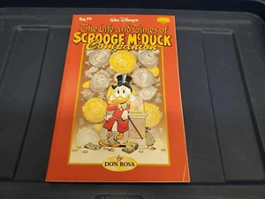 The Life and Times of Scrooge McDuck Walt Disney Paperback Don Rosa - Picture 1 of 5