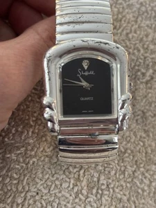 Vintage Sheffield Wristwatch Watch Silver Tone Elastic Metal Band Womens - Picture 1 of 2