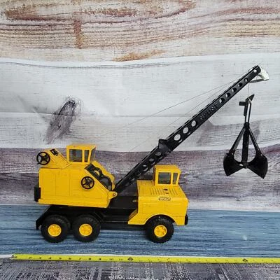 Grúa pala de acero prensado vintage Nylint Michigan camión grande amarillo/negro  Foto 1 de 4
