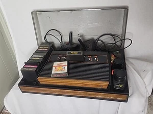 Atari 2600 Pac Man MS Pac Man W/ additional games 2 joysticks 2 Paddles Extras - Picture 1 of 6