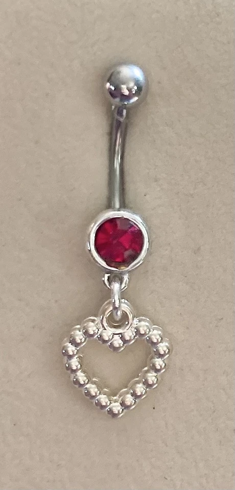 Anillo para vientre contorno de corazón colgante de plástico plateado Foto 1 de 1