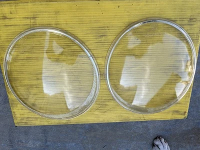 Par de lentes de faros de vidrio para Volkswagen VW Bug E1067101 Hella 180E254 Foto 1 de 4