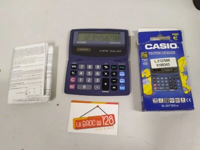 Calculatrice CASIO | solaire | deux lames | SL-207TER | euros et taxes - PROPRE - Photo 1/4