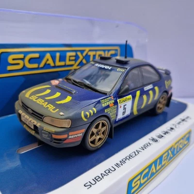 Coche Ranura Scalextric C4555a Subaru Impreza WRX Carlos Sainz - Librea Desgastada Foto 1 de 4