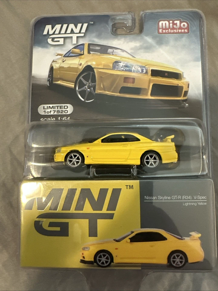 Mini GT MGT00341 Nissan Skyline GT-R (R34) V-Spec 1:64 Diecast Car - Amarillo Foto 1 de 1