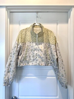 Chaqueta cortavientos Aeropostale recortada blanca y amarilla floral talla XL Foto 1 de 4