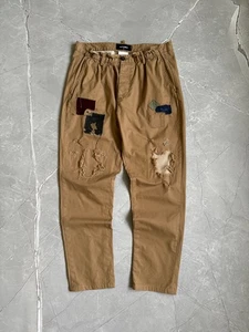 Pantalones recortados pintados con retazos desgastados Dsquared2 para hombre talla 48 beige - Imagen 1 de 24