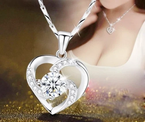 CATENINA IN RAME COLOR ARGENTO CON CIONDOLO CUORE E ZIRCONI BIANCO PER DONNA - Immagine 1 di 1