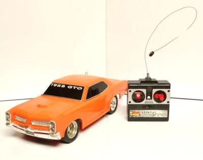 VTG 1966 ORANGE GTO REMOTE CONTROL CAR  1:15 Scale (working)  Eztec - Image 1 of 4