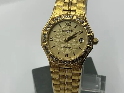 RELOJ SUIZO DE CUARZO WITTNAUER MONTEGO ORO DIAMANTE BISEL NÚMEROS ROMANOS DAMAS Foto 1 de 4