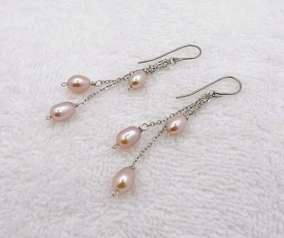 Pendientes colgantes de perlas de agua dulce de arroz cultivado genuino ovalado púrpura de calidad ERD03 Foto 1 de 4