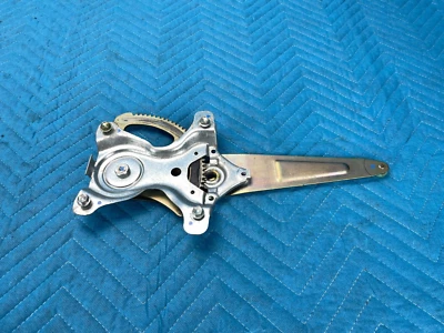 Regulador de ventana de puerta trasera lado del conductor Lexus LX470 Toyota Land Cruiser 98-07 OEM Foto 1 de 4
