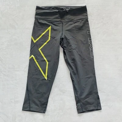 Medias de compresión 2XU Capri para correr pequeñas grises y amarillas Foto 1 de 4