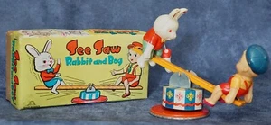 NMIB Fuji Press Kogyosho Japan Tin Wind-Up See Saw Rabbit And Boy Celluloid - Picture 1 of 5