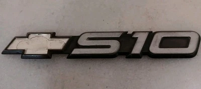 Chevrolet S10 S 10 1991-2004 puerta trasera símbolo Lodo insignia emblema OEM Foto 1 de 4