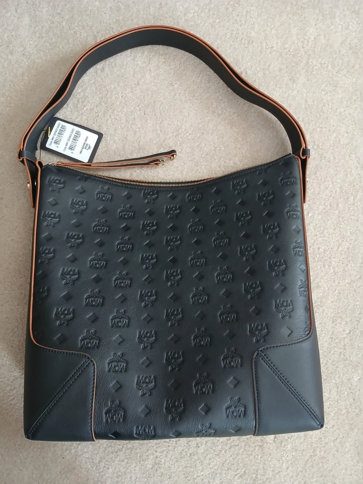 MCM Klara Hobo in Monogram Leather | Color BLACK / Size Large.